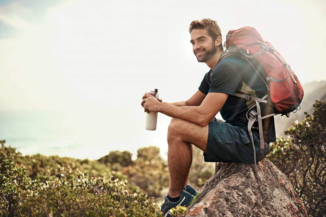 Man Sitting During Hike