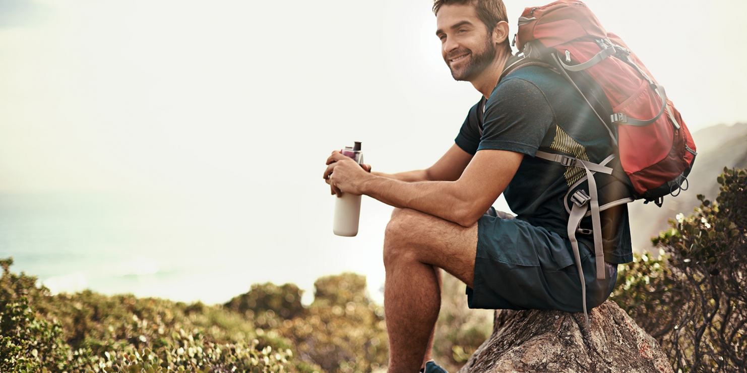 Man Sitting During Hike