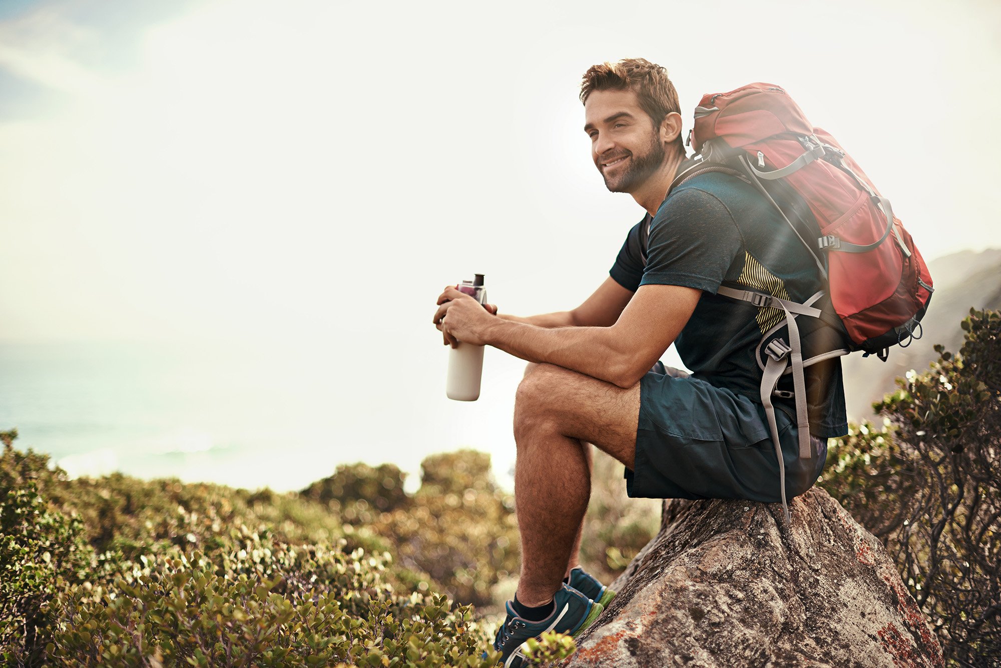 Man Sitting During Hike