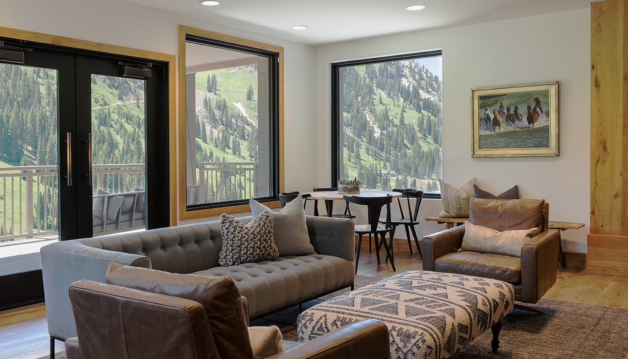 Indoor gathering space with view of mountains