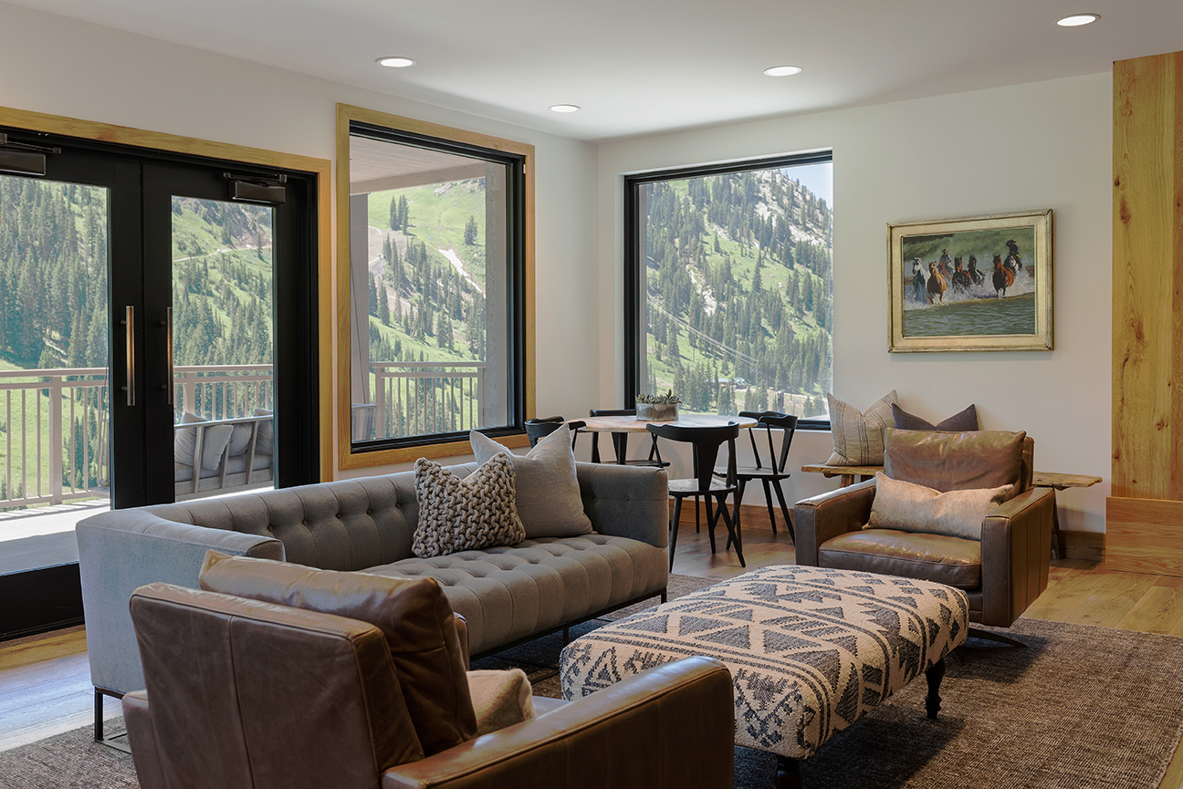 Indoor gathering space with view of mountains