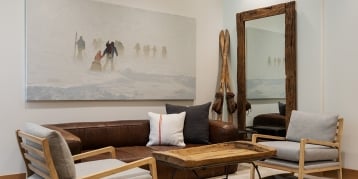 Seating room with large painting