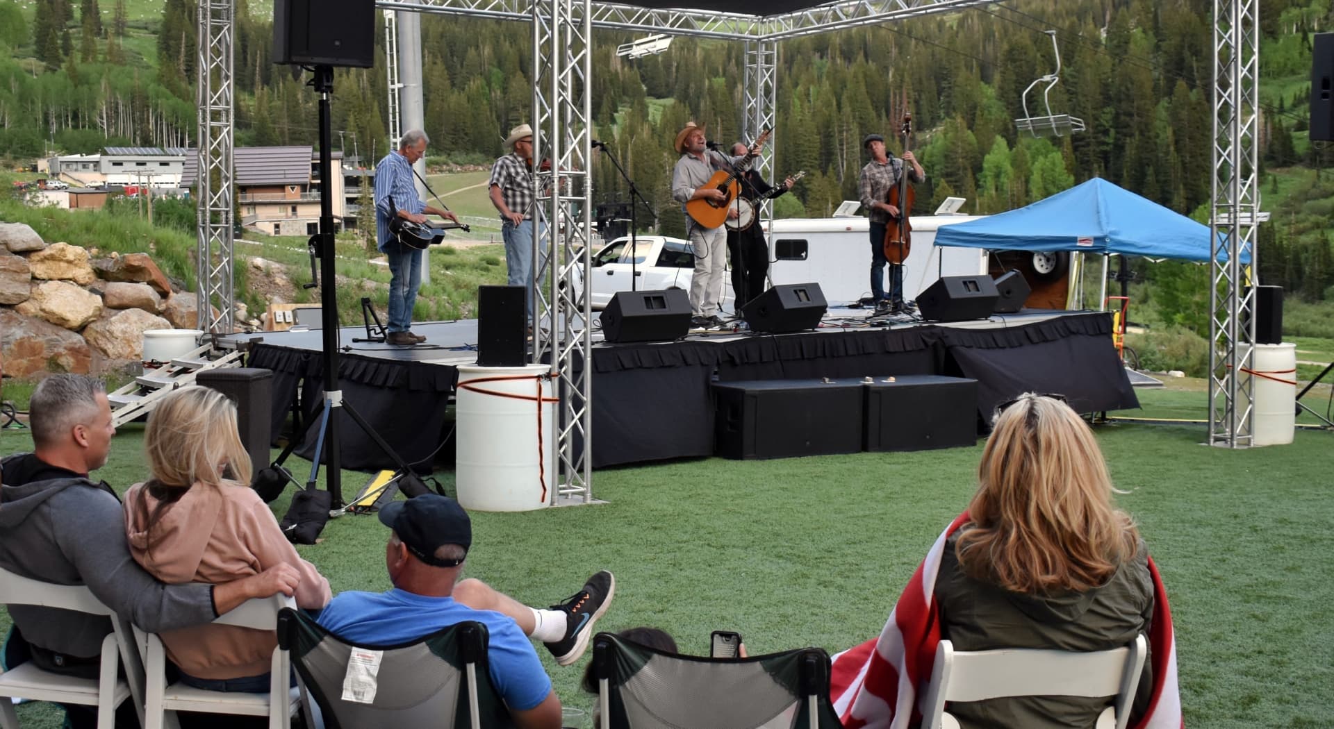 A band performs on outdoor stage.