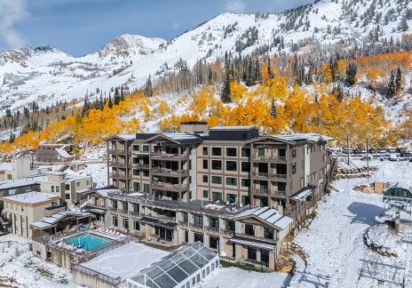 Luxury mountain lodge surrounded by snow