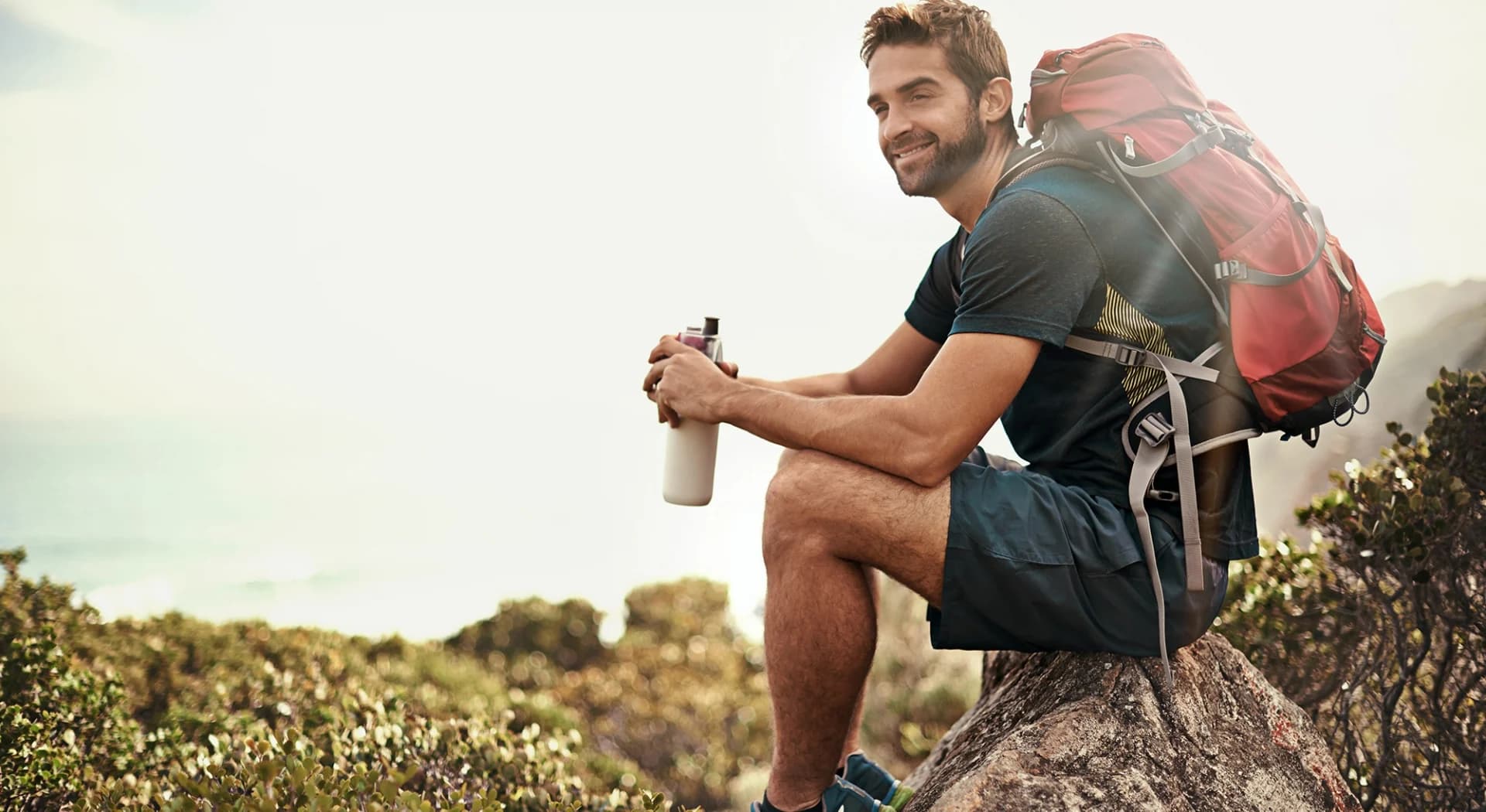 Man Sitting During Hike